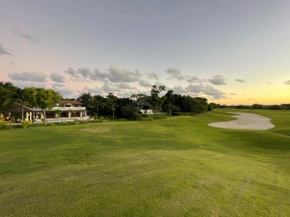 Golf and beach resort villa with beautiful sunsets pool golf cart and service staff